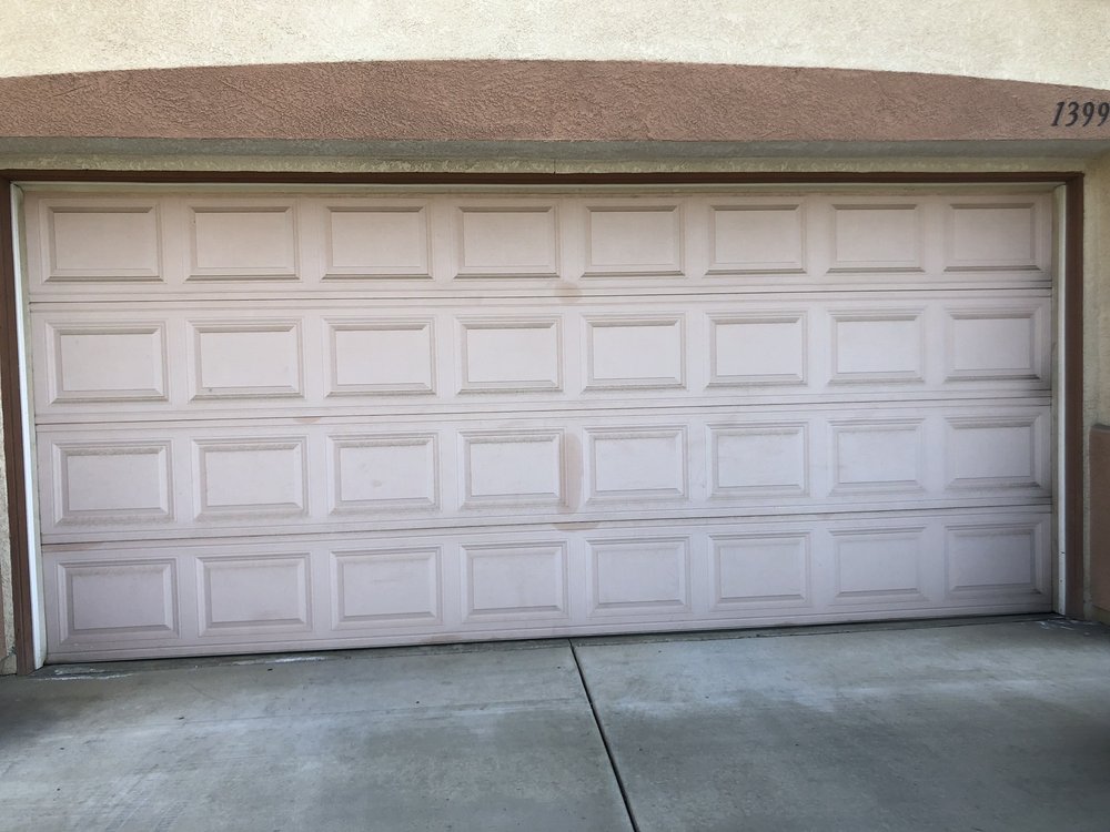 Before photo of faded garage door